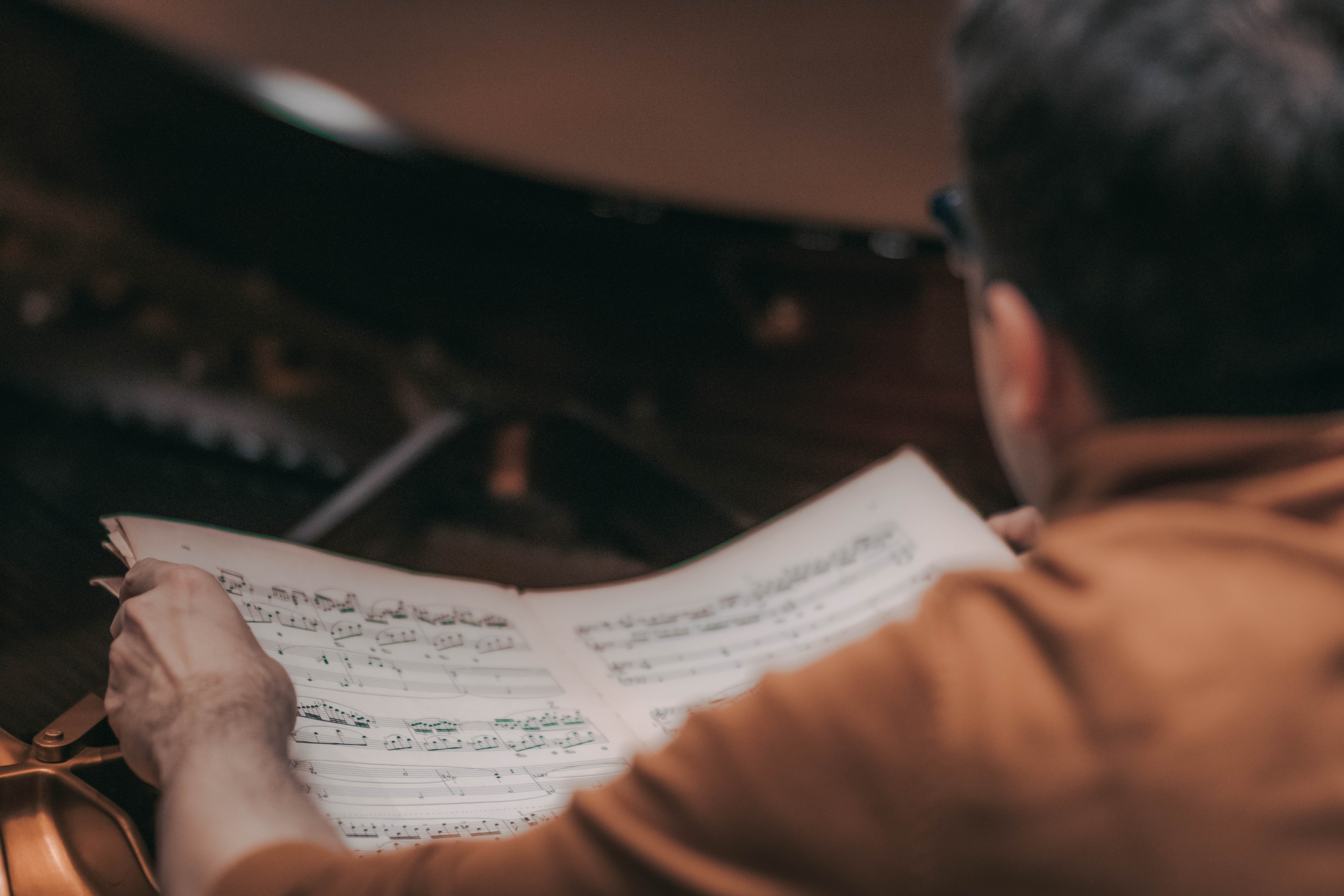 Sheet music detail — over-the-shoulder view